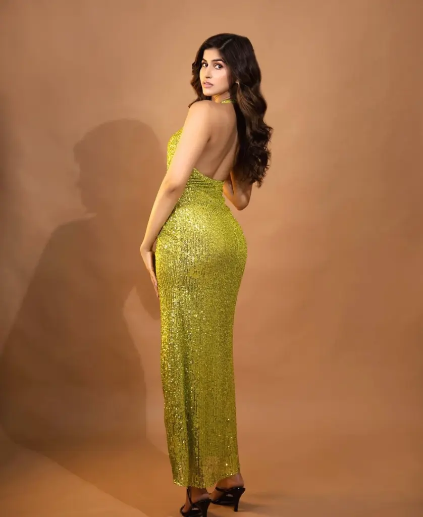 sakshi green stone top wear .webp